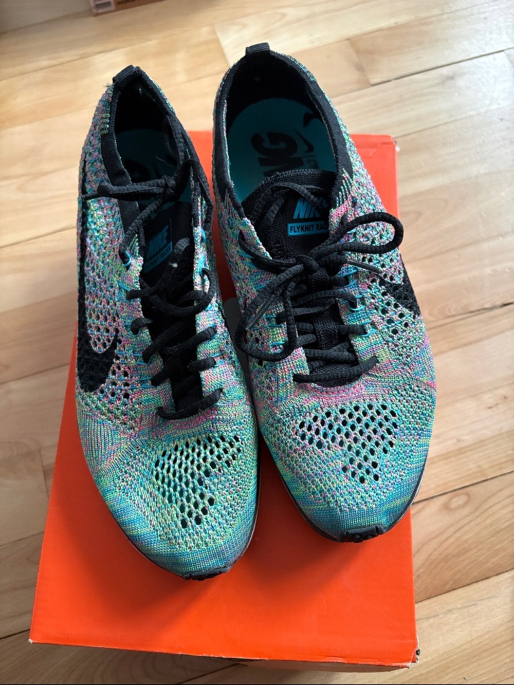 Nike Women’s Flyknit Multicolor Running Shoes with Black Swoosh